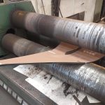 Plasma cut Hardox 450 petal being rolled