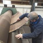 10mm Hardox back plate being rolled.